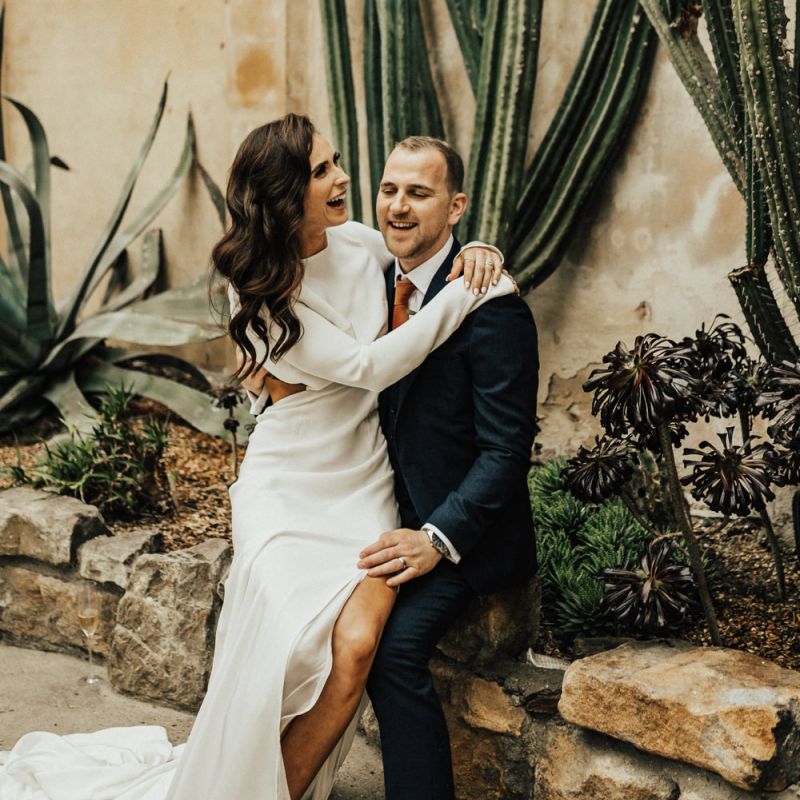 Bride and Groom Laughing and Embracing