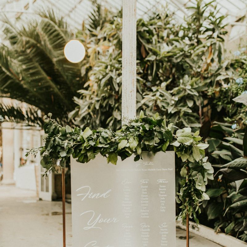 Copper Framed Table Plan with Grey Seating Chart and Foliage Decor