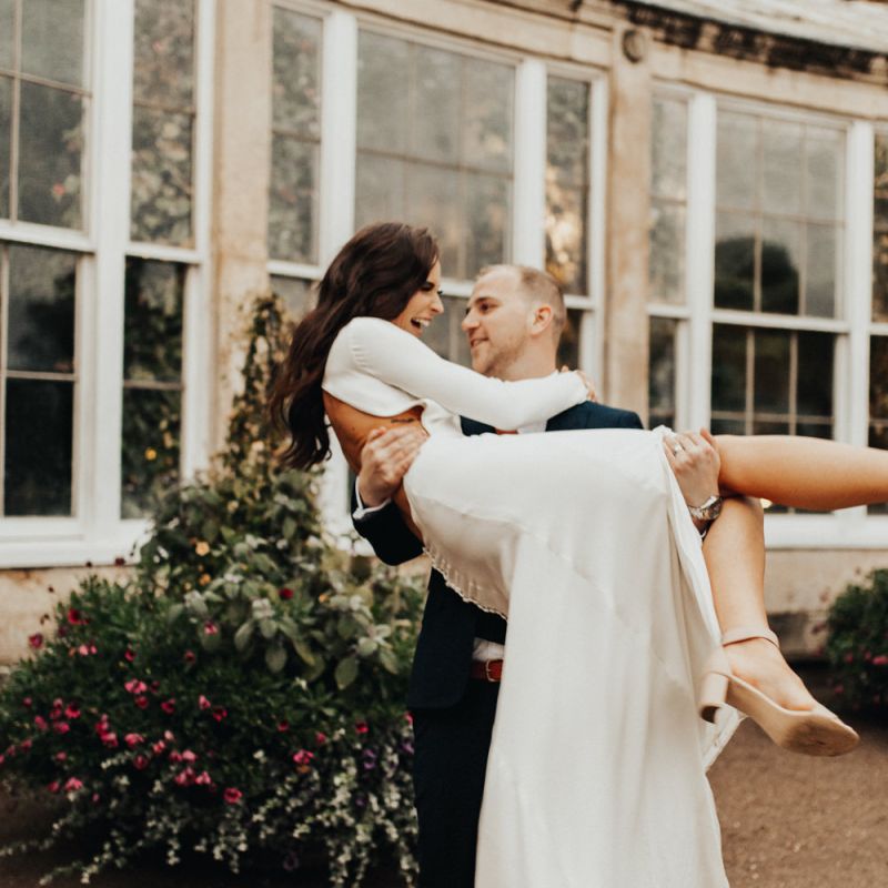 Groom Lifting His Bride Up