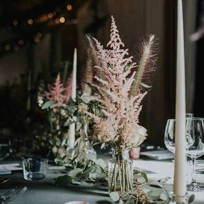Pink Astilbe And Tall Tapered Candles For Wedding Reception