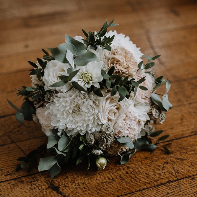 Bridal Bouquet of White and Blush Pink Flowers with Eucalyptus and Trailing Silk Ribbon | Floral Arch and Bride in Batwing Sleeve Halfpenny Dress for London Pub Wedding | Caitlin + Jones