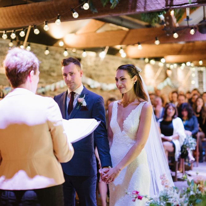 Rustic Barn Wedding Ceremony with Fairy Light Decor