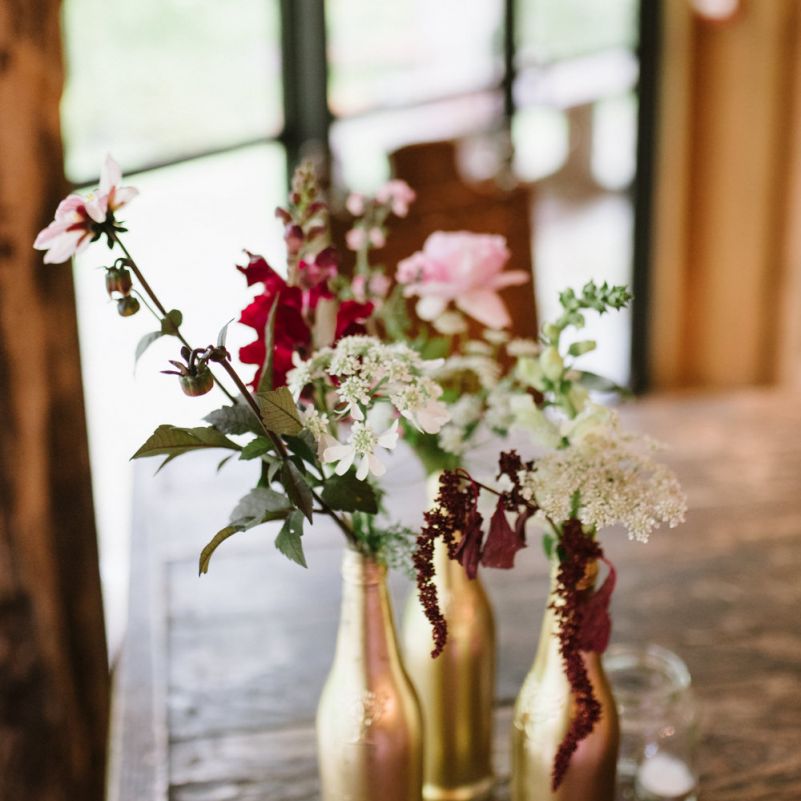 Wild Flowers in Gold Spray Painted Bottles
