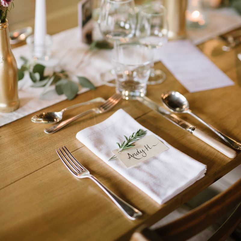 Elegant Place Setting with Napkin, Place Name Card and Rosemary Sprig