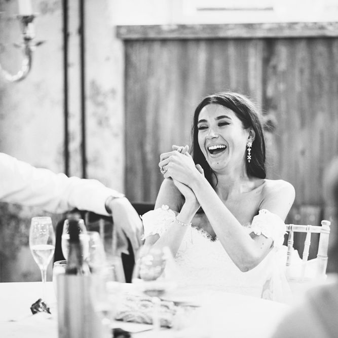 Bride in Fishtail Pronovias Wedding Dress with Off Shoulder Sleeves and Veil Cape | Bride Wearing Hair Down | Lace Bridal Cape Veil &amp; Fishtail Wedding Dress by Pronovias | On Love and Photography