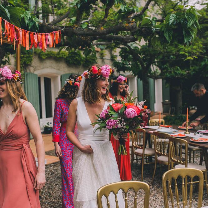 Bridal Party Enter Ceremony With  A Flower Crown For Bride Ceremony