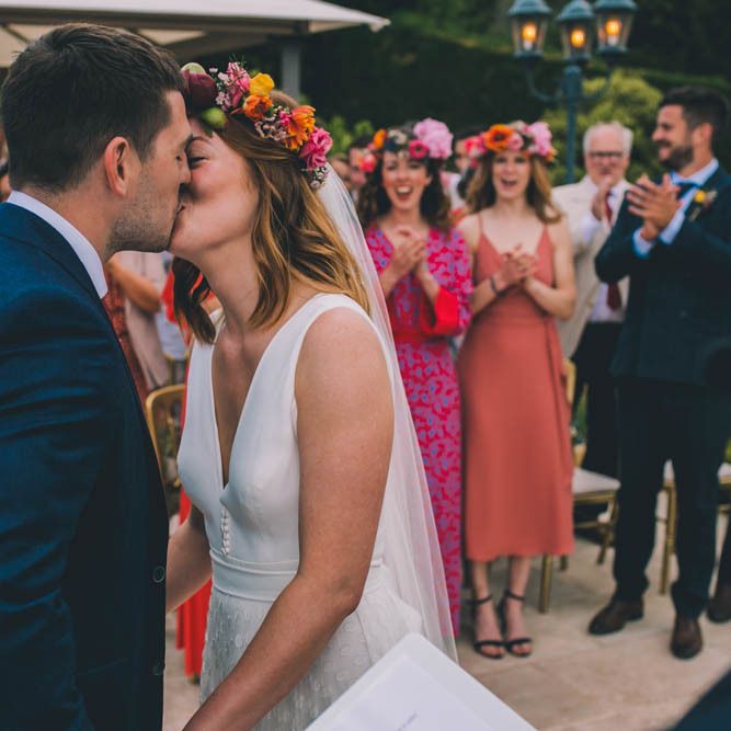 Bride And Groom Kiss At Ceremony