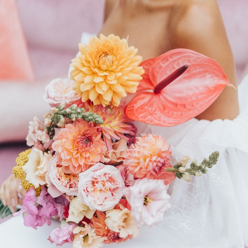 Blush wedding bouquet with anthuriums and dahlias