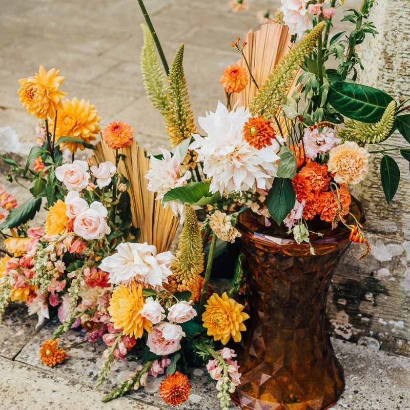 Orange, yellow and green flower arrangement at Chiddingstone Castle