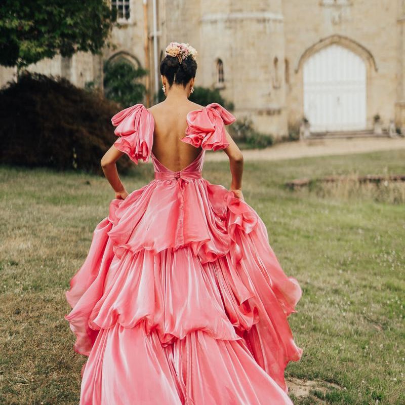 bride in colourful wedding dress at Chiddingstone Castle