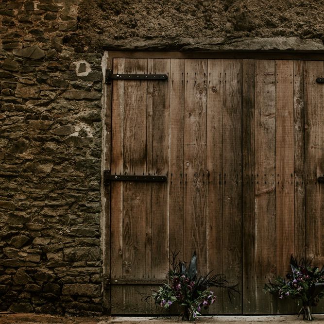 Rustic Barn Door &amp; Bouquets | Forest Green and Black Dark Decadence Wedding Inspiration in a Rustic Barn Planned &amp; Styled by Knots &amp; Kisses with Images by Daze of Glory Photography