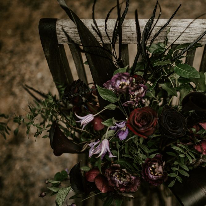 Deep Red, Plum &amp; Purple Wedding Bouquet Flowers | Forest Green and Black Dark Decadence Wedding Inspiration in a Rustic Barn Planned &amp; Styled by Knots &amp; Kisses with Images by Daze of Glory Photography
