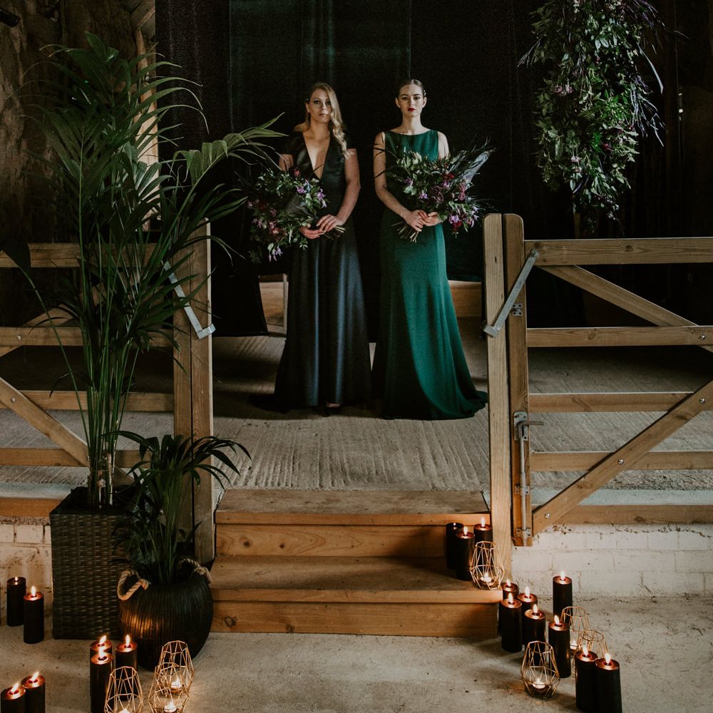 Foliage &amp; Candle Light Altar Wedding Decor | Forest Green Bridesmaid Dresses | Forest Green and Black Dark Decadence Wedding Inspiration in a Rustic Barn Planned &amp; Styled by Knots &amp; Kisses with Images by Daze of Glory Photography