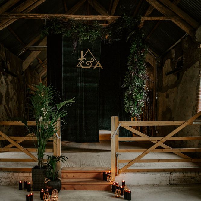 Foliage &amp; Candle Light Altar Wedding Decor | Forest Green and Black Dark Decadence Wedding Inspiration in a Rustic Barn Planned &amp; Styled by Knots &amp; Kisses with Images by Daze of Glory Photography