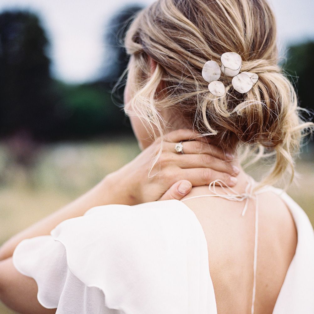Messy Bun Bridal Hairstyle with Mother of Pearl Hair Accessory | Bride in Lace Cherry Williams London Gown | Elegant Summer Inspiration at St Giles House, Dorset by Jessica Roberts Design   Imogen Xiana Photography