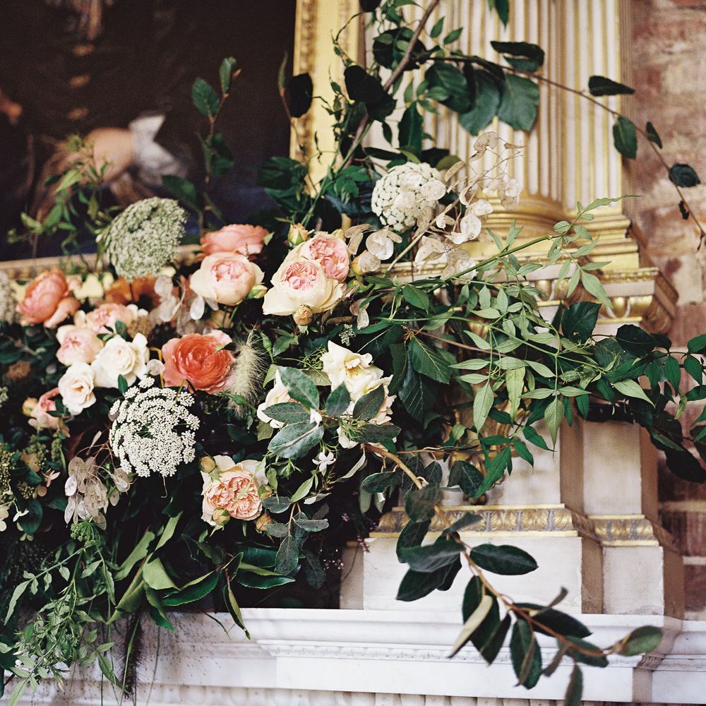 Living Coral, White &amp; Greenery Fireplace Mantel Wedding Flowers | Elegant Summer Inspiration at St Giles House, Dorset by Jessica Roberts Design   Imogen Xiana Photography