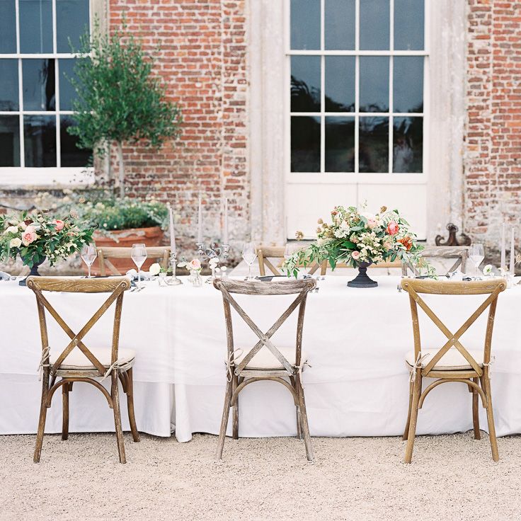 Outdoor Tablescape with Living Coral, White &amp; Greenery Floral Centrepieces | Elegant Summer Inspiration at St Giles House, Dorset by Jessica Roberts Design   Imogen Xiana Photography