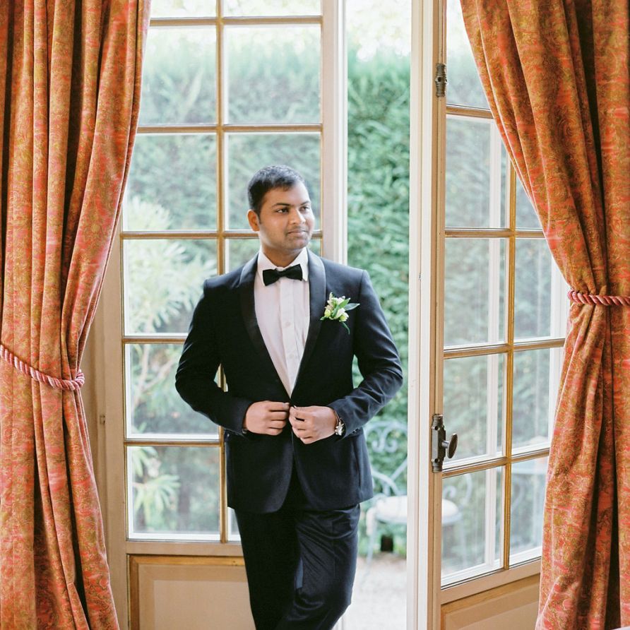 Groom in Black Tuxedo and Bow Tie