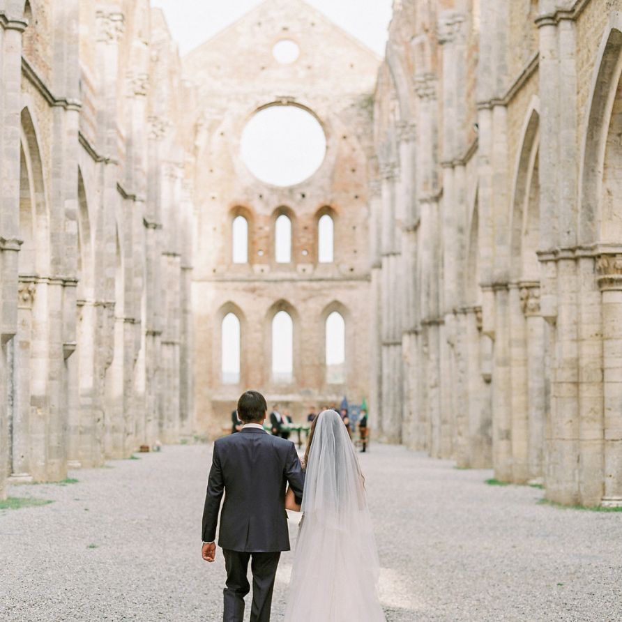 Bride Walking Down the Aisle of a Tuscan Open Air Church