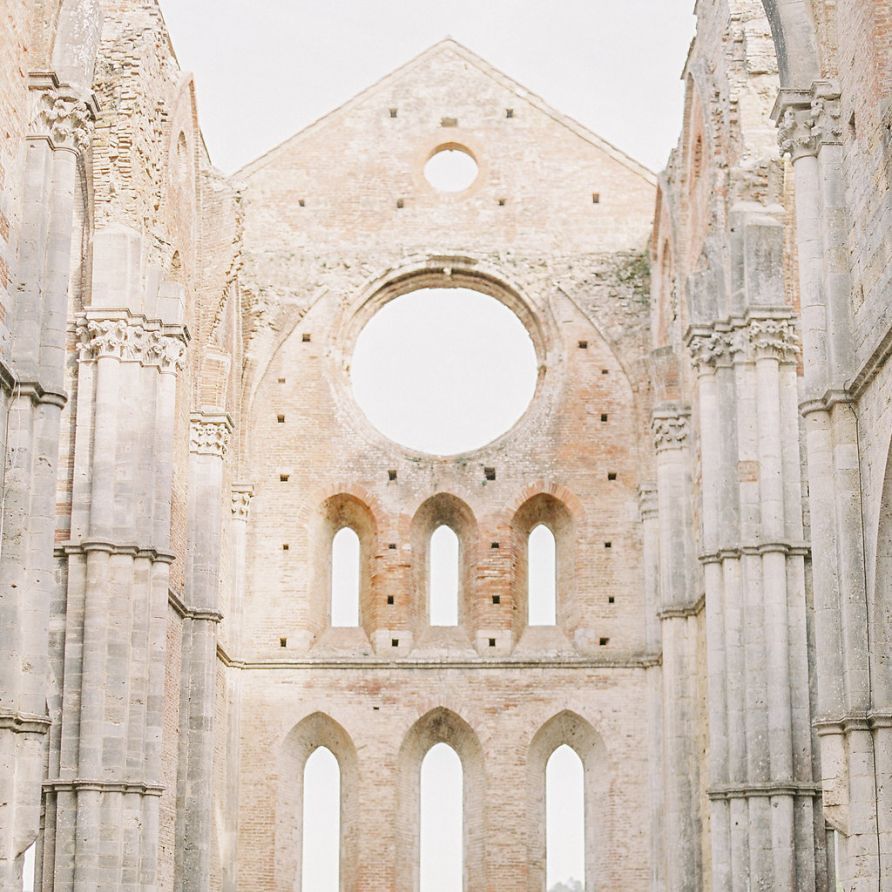 Bride and Groom Exchanging Vows at Their Open Air Church Wedding Ceremony