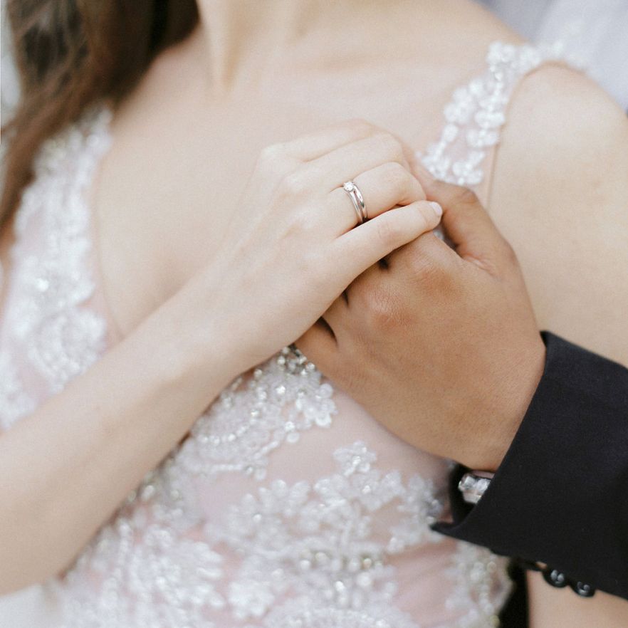 Bride and Groom Holding Hands
