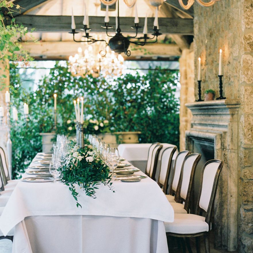 Intimate Wedding Breakfast with Greenery Runner and Chandelier Lights