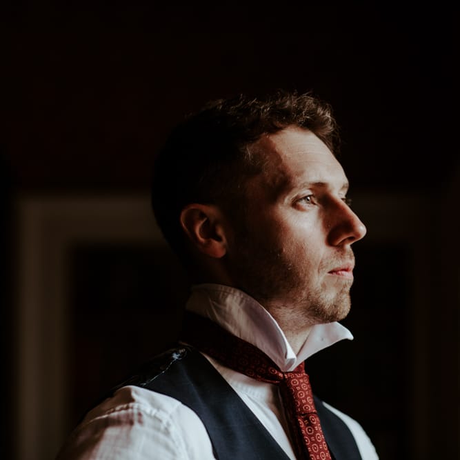 Groom getting ready on wedding morning
