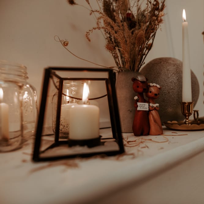 Candles and wooden figures for September 2020 wedding
