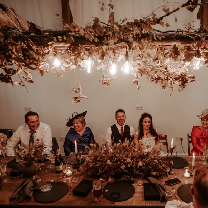 Micro wedding reception with light installation