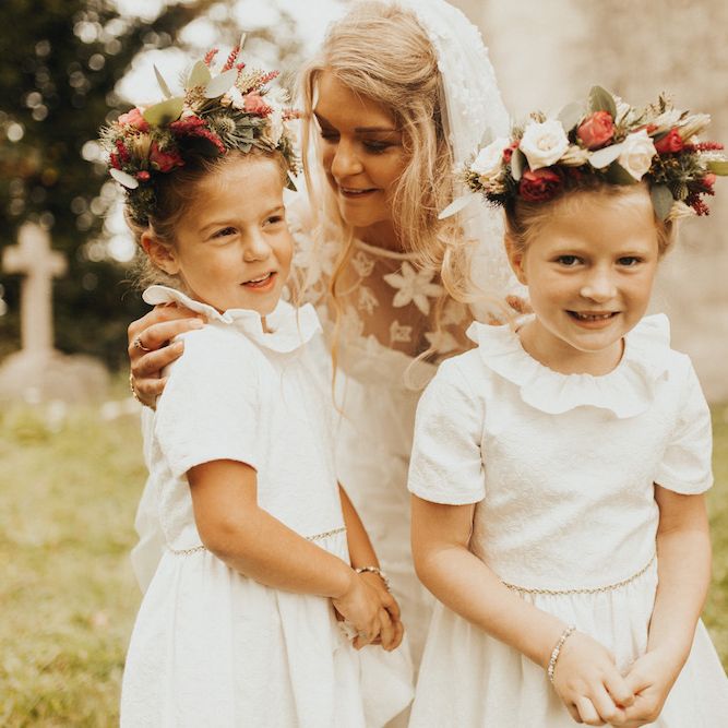Bride in Eliza Jane Howell wedding dress  with flower girl daughters