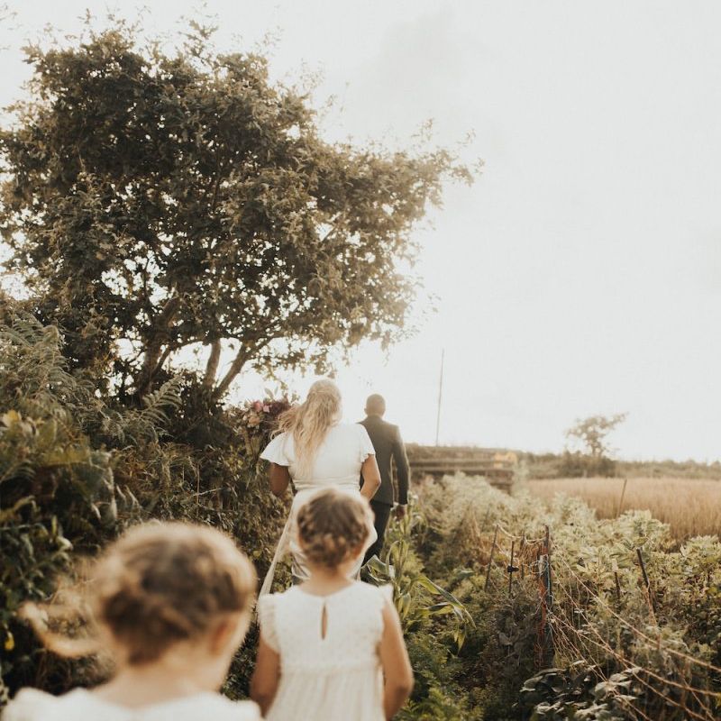 Family walking through Dartmoor Field wedding venue
