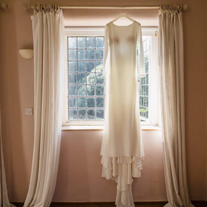 Long Sleeved Wedding Dress with Plunging V Back and Cuff Buttons by Pronovias | Ivania Pronovias Wedding Dress with Long Sleeves and Minimalist Styling | Chris Barber Photography