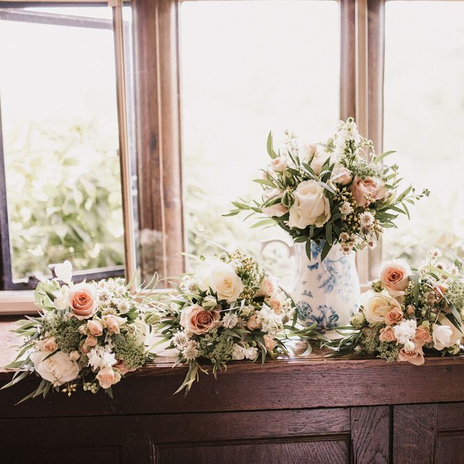 White, Pink and Foliage Wedding Bouquets