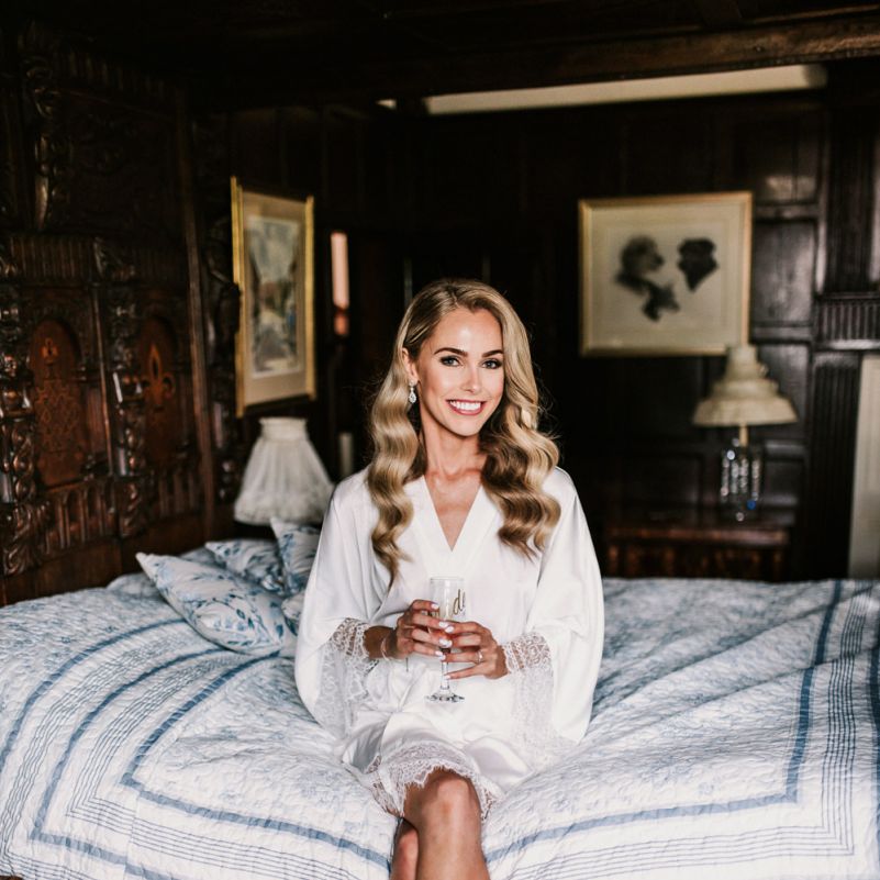 Bride on Wedding Morning in White Getting Ready Robe and Finger Wave Hair
