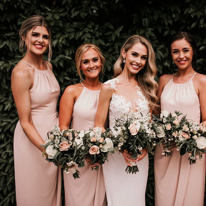 Bridal Party with Bridesmaids in Halterneck Pink Shona Joy Dresses and Bride in Pronovias Wedding Dress