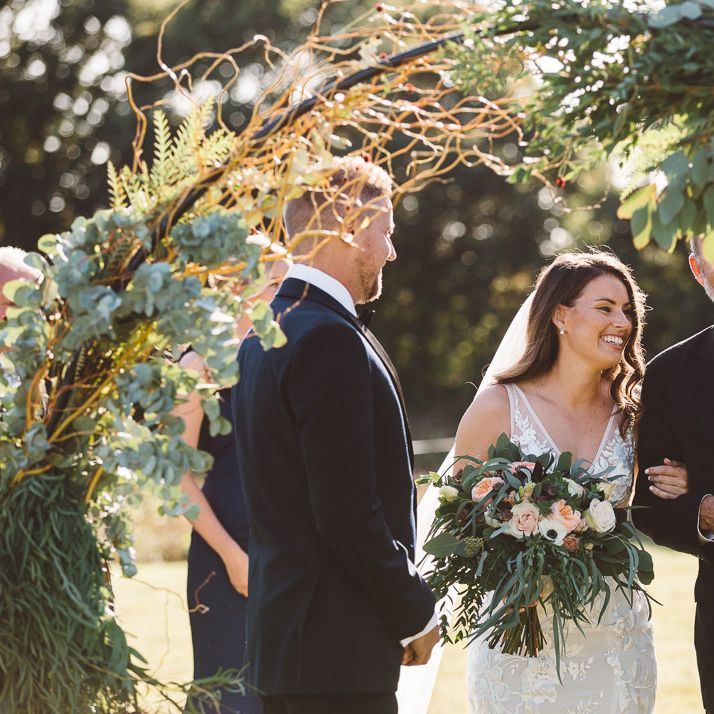 Bride and groom tie the knot at Crouchers Orchards for sophisticated outdoor ceremony