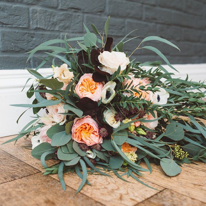 Floral and eucalyptus wedding bouquet at intimate celebration