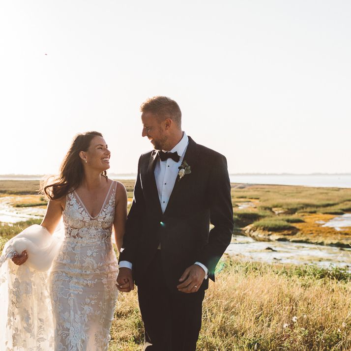 Bride and groom steal a moment together and enjoy golden hour