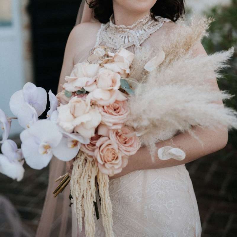 Stunning orchid bouquet with pampas grass