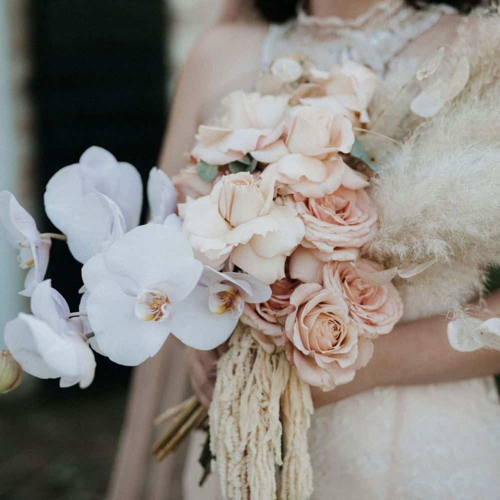 Stunning orchid bouquet with pampas grass