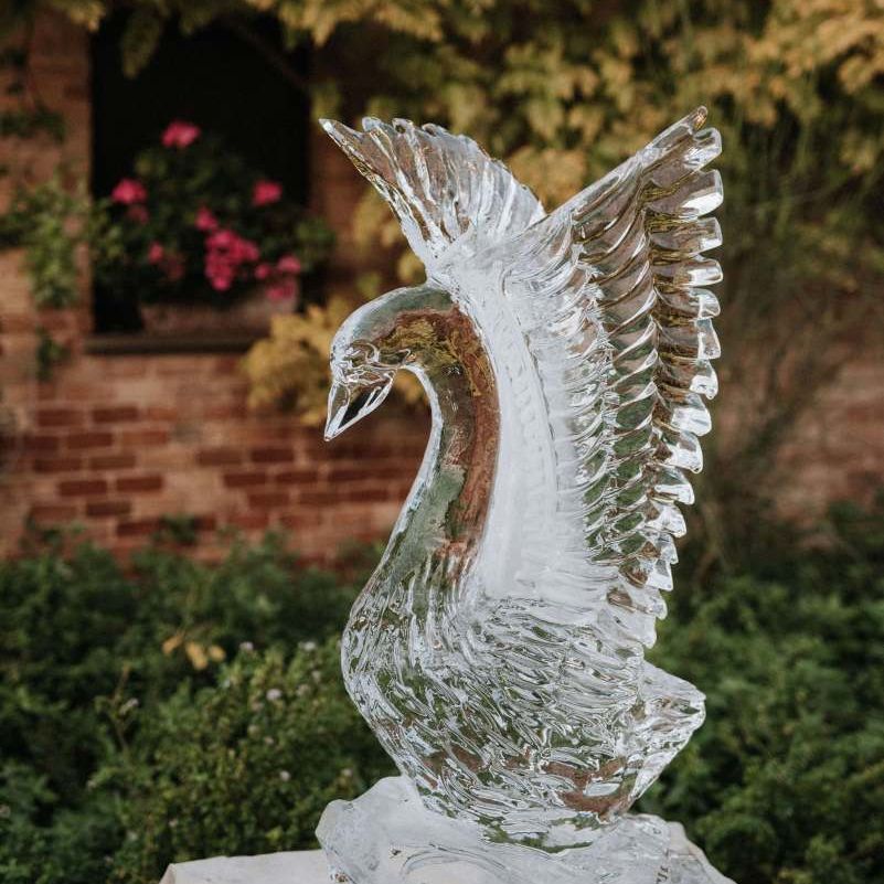 Swan ice sculpture at Italian wedding