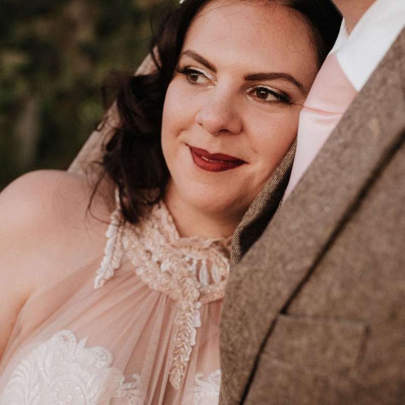 Bride in homemade halterneck wedding dress