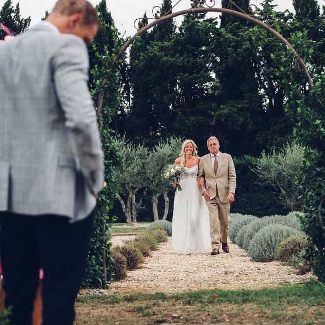 Wedding Ceremony Bridal Entrance in Needle &amp; Thread Wedding Dress | Outdoor Destination Wedding at Le Peit Hameau Wedding Venue Provence, South of France Planned by By Mademoiselle | Lovestruck Photography