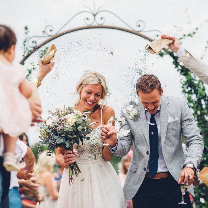 Confetti Exit | Bride in Needle &amp; Thread Gown | Groom in Reiss Chinos &amp; Blazer | Outdoor Destination Wedding at Le Peit Hameau Wedding Venue Provence, South of France Planned by By Mademoiselle | Lovestruck Photography