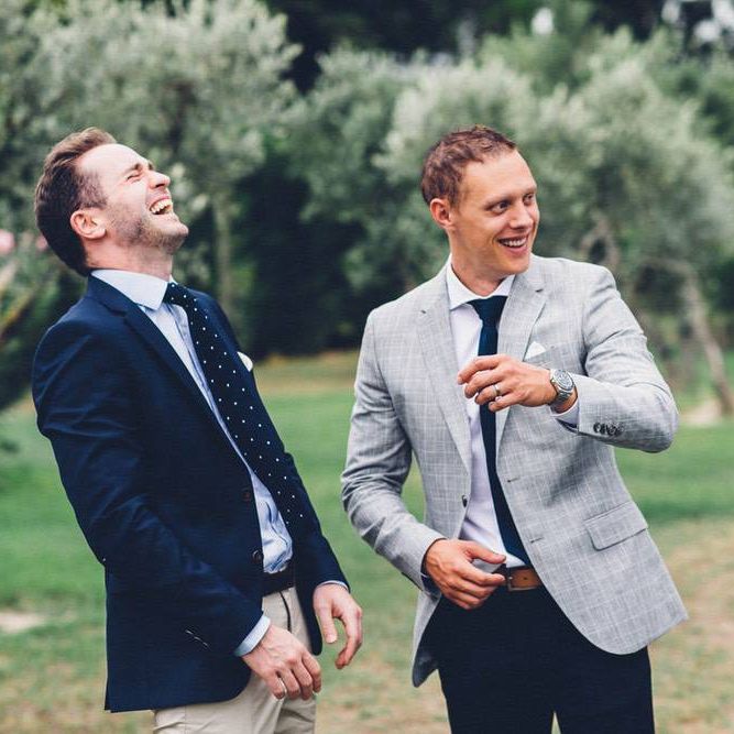 Groom in Reiss Navy Chinos &amp; Grey Check Blazer | Outdoor Destination Wedding at Le Peit Hameau Wedding Venue Provence, South of France Planned by By Mademoiselle | Lovestruck Photography