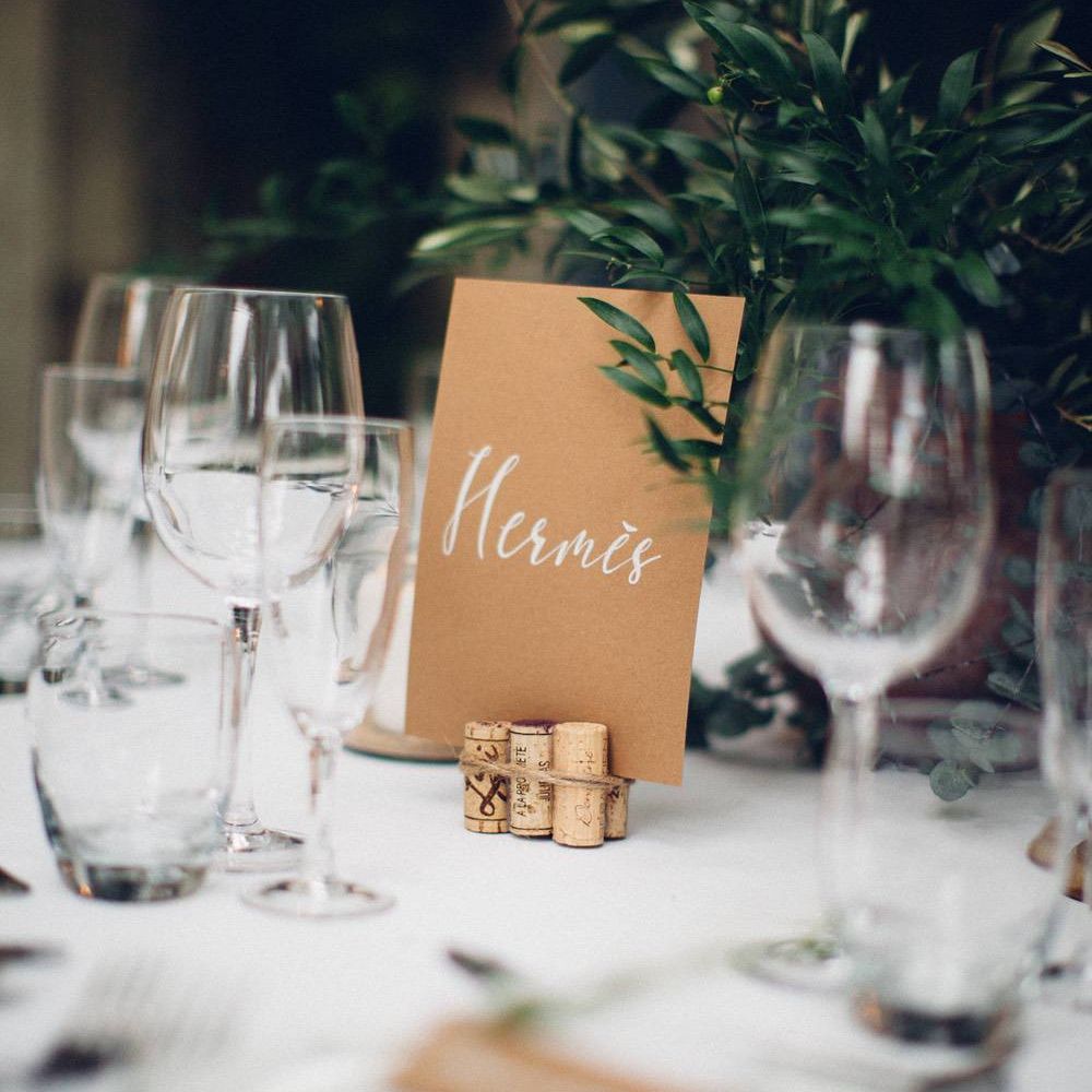 Craft Paper Table Name in Cork Holder | Wedding Decor | Outdoor Destination Wedding at Le Peit Hameau Wedding Venue Provence, South of France Planned by By Mademoiselle | Lovestruck Photography