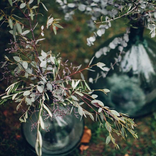 Wedding Flowers in Coloured Glass Vases | Wedding Decor | Outdoor Destination Wedding at Le Peit Hameau Wedding Venue Provence, South of France Planned by By Mademoiselle | Lovestruck Photography