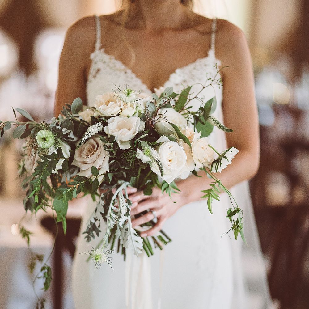White Rose Wedding Bouquet // Brookfield Barn Wedding Venue With Rustic Styling And Bride In Enzoani With Images From Lemonade Pictures And Film By Kitebox Films