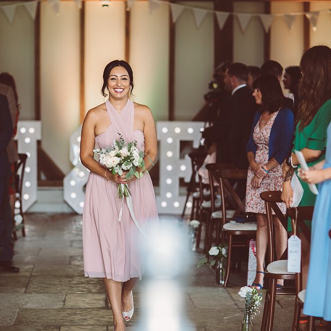 Bridesmaids In Pale Pink Dresses // Brookfield Barn Wedding Venue With Rustic Styling And Bride In Enzoani With Images From Lemonade Pictures And Film By Kitebox Films