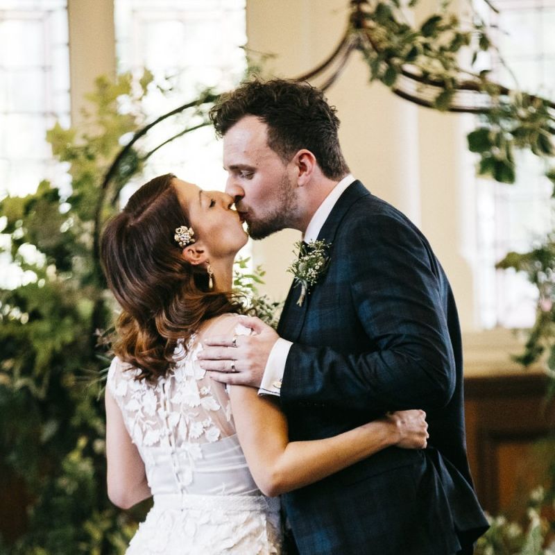 Bride wearing Phase Eight Wedding Dress and embellished hair accessory